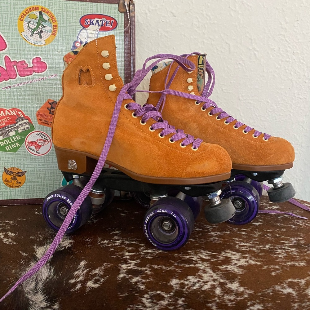 Orange Moxi Roller Skates with Purple Laces